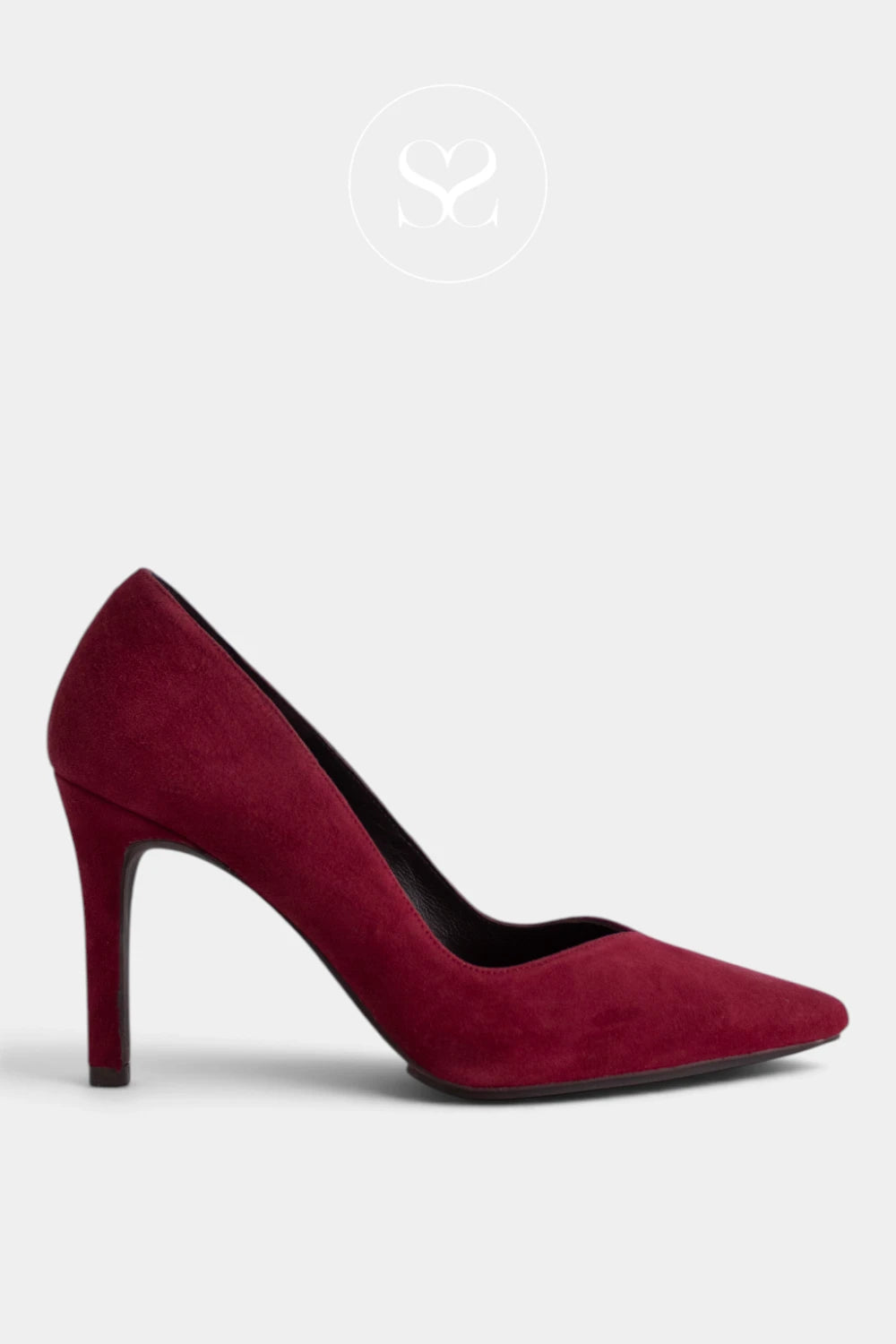 A single deep burgundy suede high-heeled pump with a pointed toe from Lodi, shown in profile against a light gray background takien in Galway \Ireland by Sheneil Shoes