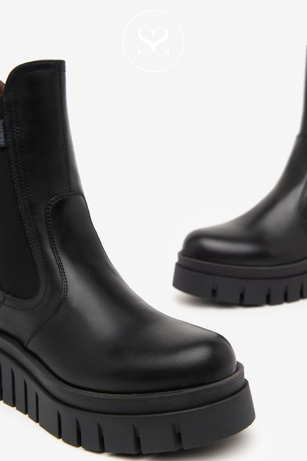 Chunky black leather wedge boots from Nero Giardini Ireland