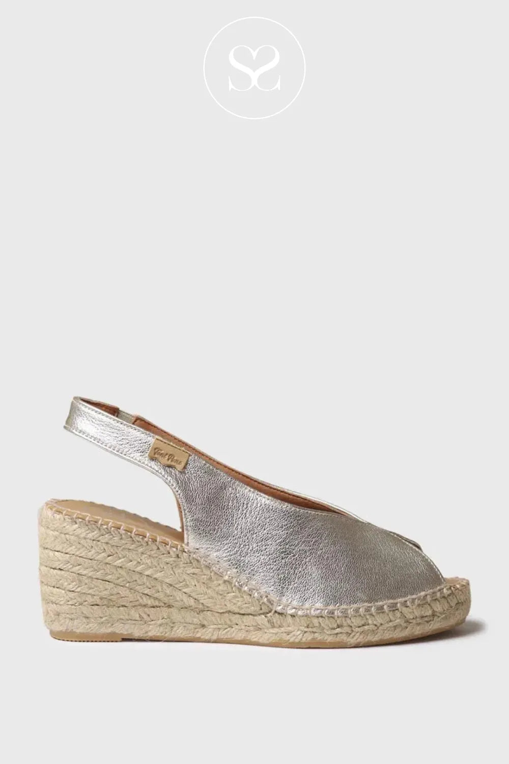 Toni Pons gold peeptoe slingback wedge sandals. Elasticated slngback strap, cushioned insole, v-cut high wedge sandal.