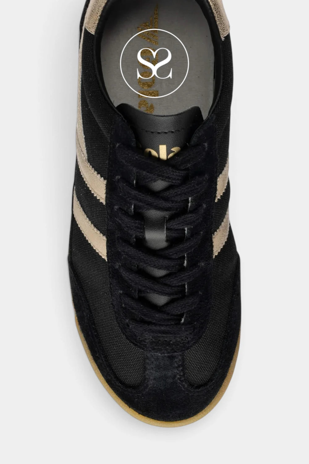 A top-down view of a black suede and mesh sneaker with beige side stripes, black laces, and a gum sole, shown on a light gray background.