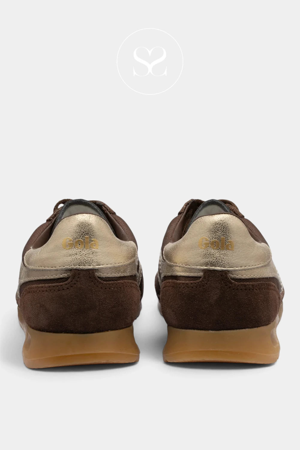 A pair of low-top sneakers shown from the back, featuring dark brown suede and metallic gold leather panels with a tan rubber sole, set against a light gray background.
