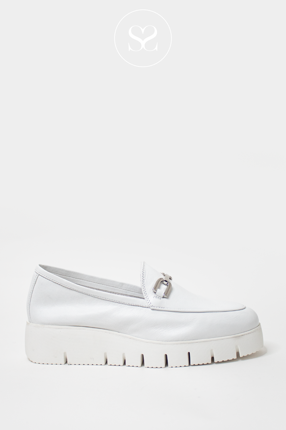UNISA FAMO WHITE LEATHER SLIP ON WEDGE LOAFERS WITH SILVER BUCKLE