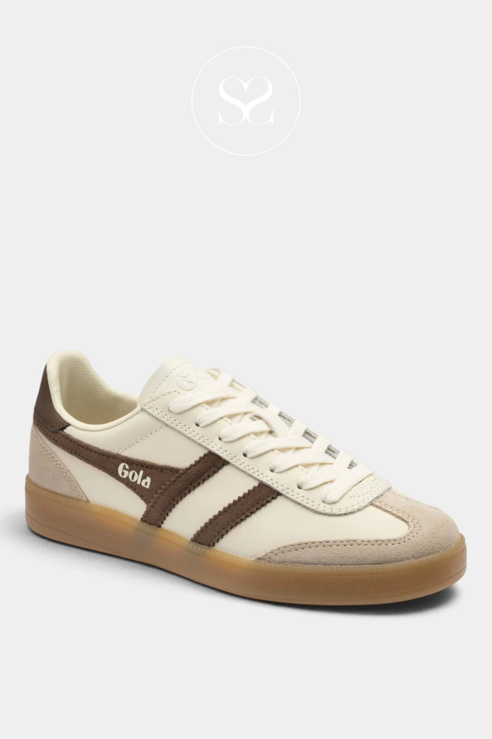 A low-top sneaker in cream and brown suede with a gum sole, featuring the brand name 'Gola' on the side, set against a light gray background.