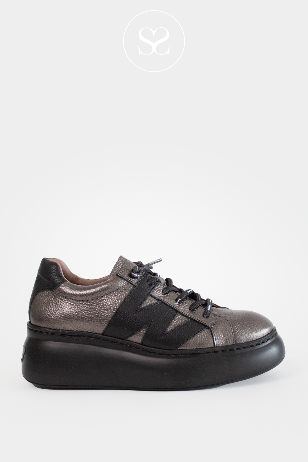 Platform wedge trainers store
