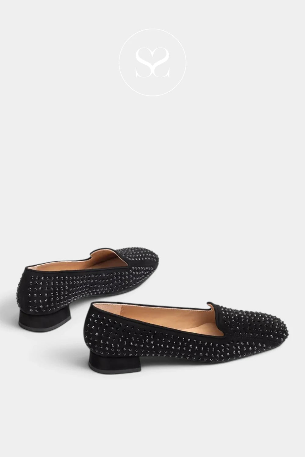 A pair of black pointed-toe flats embellished with silver studs, shown from two angles on a light gray background.