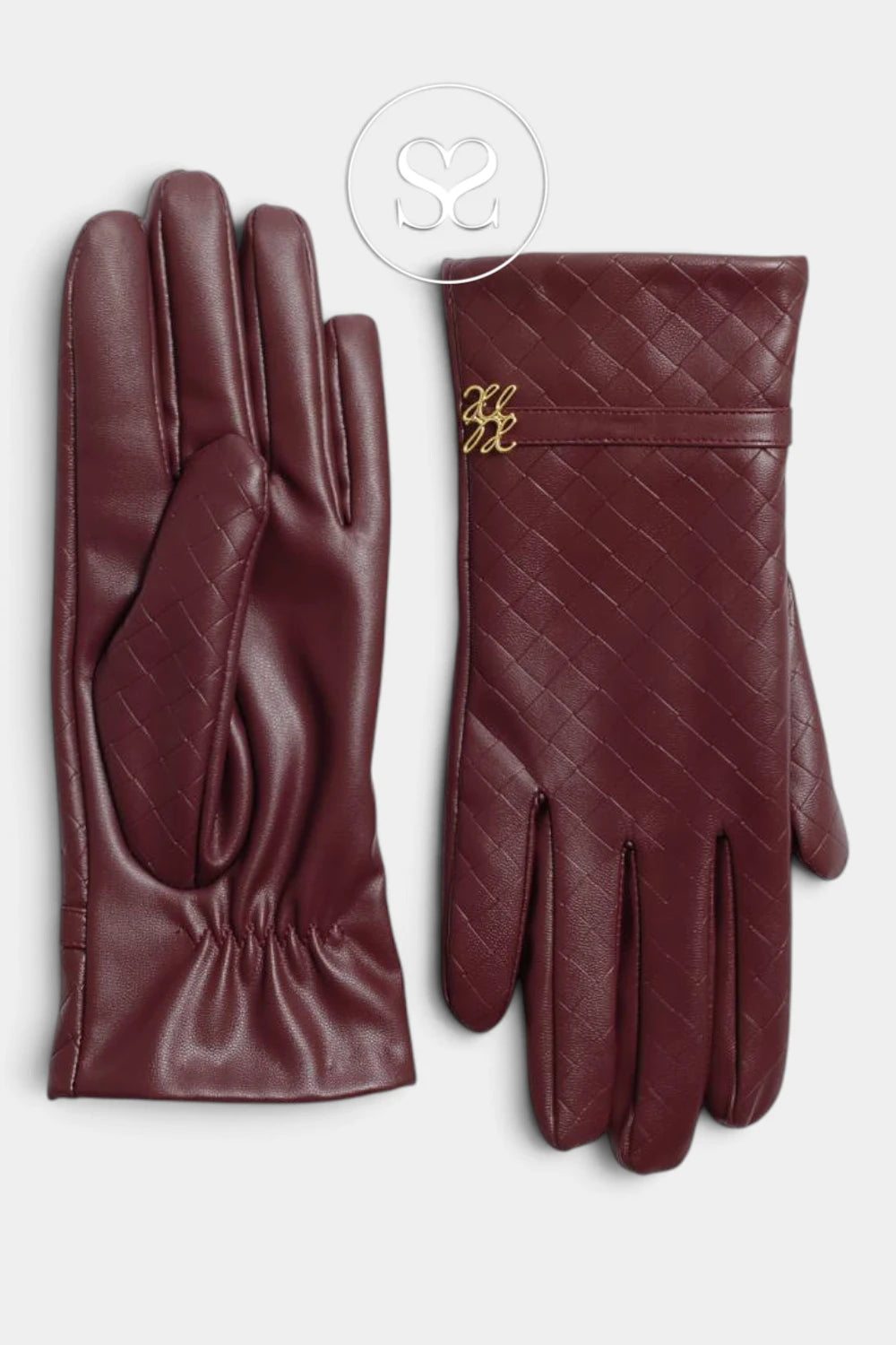 A pair of burgundy leather gloves, one showing the smooth back of the hand and the other showing the quilted Bottega Veneta Jodie weave pattern with a gold-tone HH logo on the wrist strap, set against a light gray background.