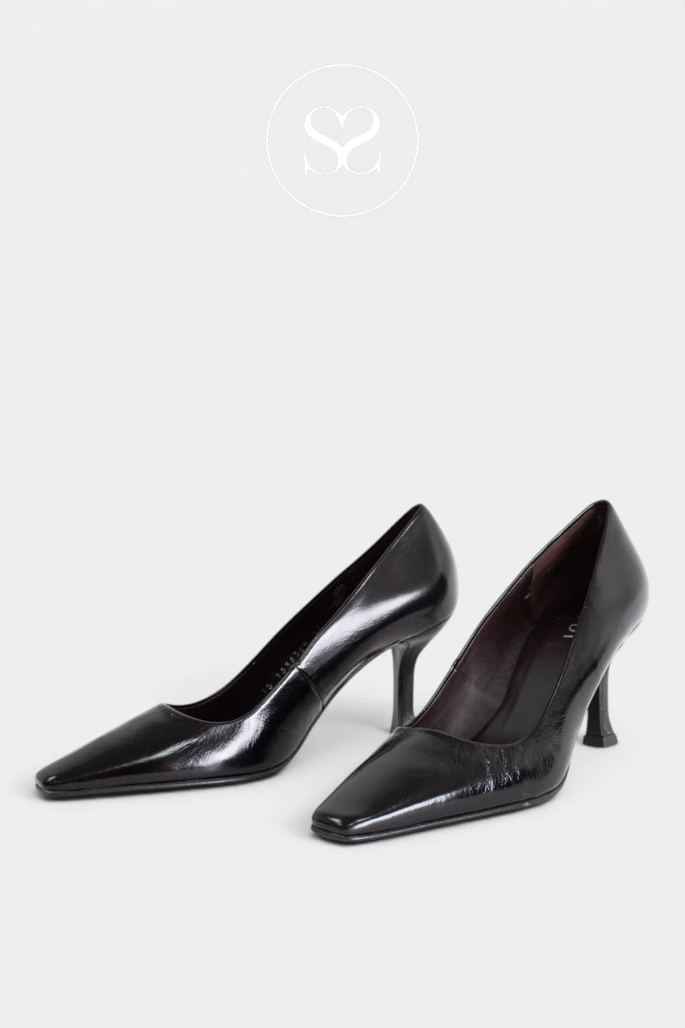 A pair of black pointed-toe kitten heel pumps with a glossy patent finish, displayed on a light gray background with a faint brand logo at the top.