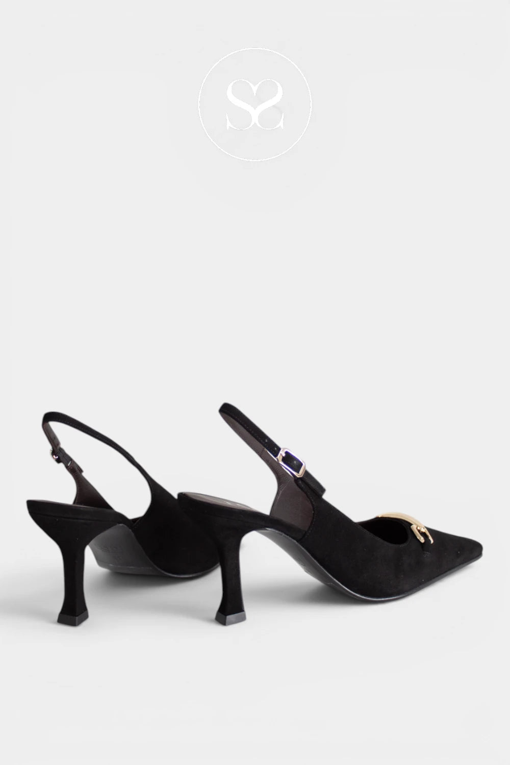 A pair of black slingback pointed-toe heels with mid-height stiletto heels, featuring a small gold-tone horsebit detail on the vamp and a dark blue accent on the buckle, shown against a light gray background.