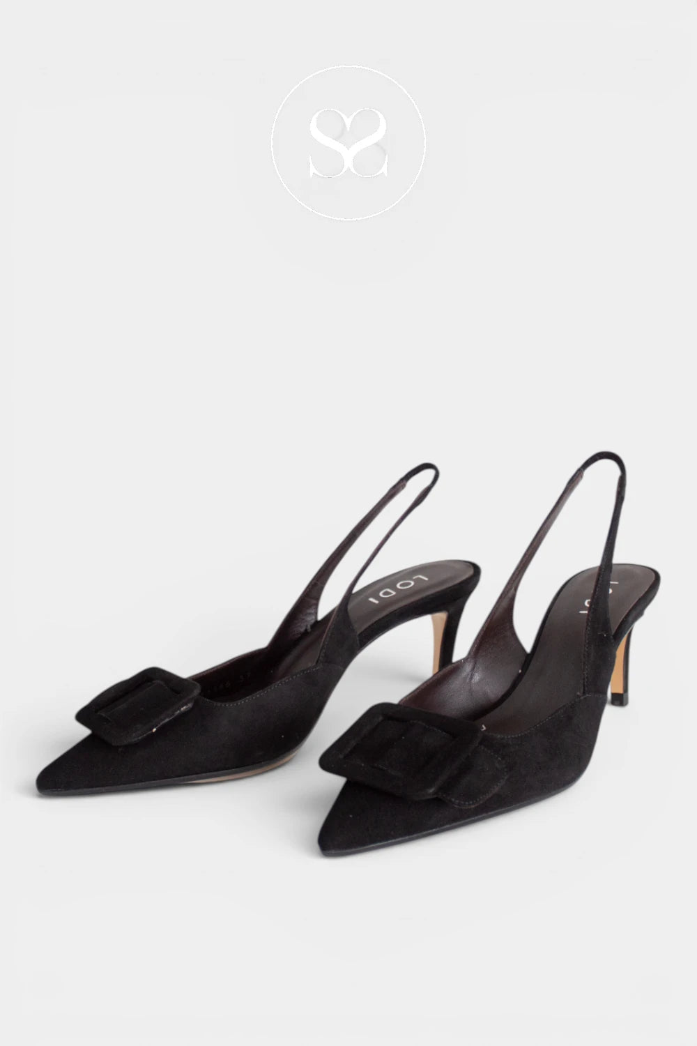 Lodi Nestor slingback court shoe is crafted in rich black suede with a pointed toe and a square buckle detail to the front. Finished with a 6.5cm heel and an elasticated slingback strap, it is designed for occasion wear, party dressing and smarter work days where a lower heel is needed.