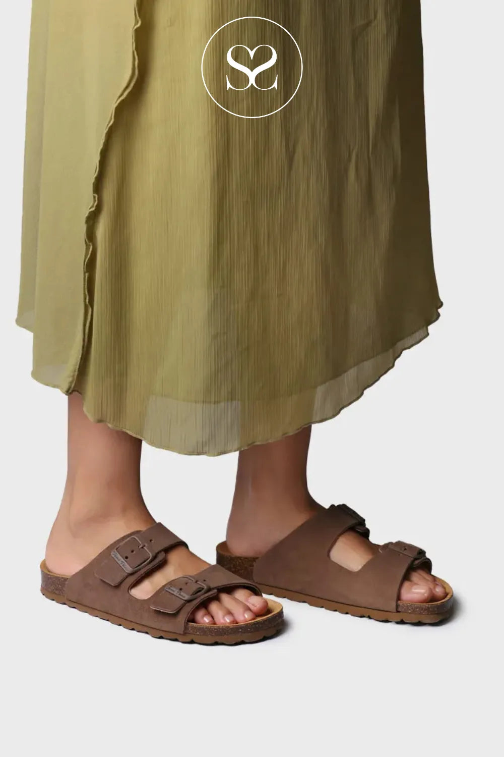 Comfortable everyday summer sandals. Flat sliders. Slip on style with double strap and two adjustable buckles.