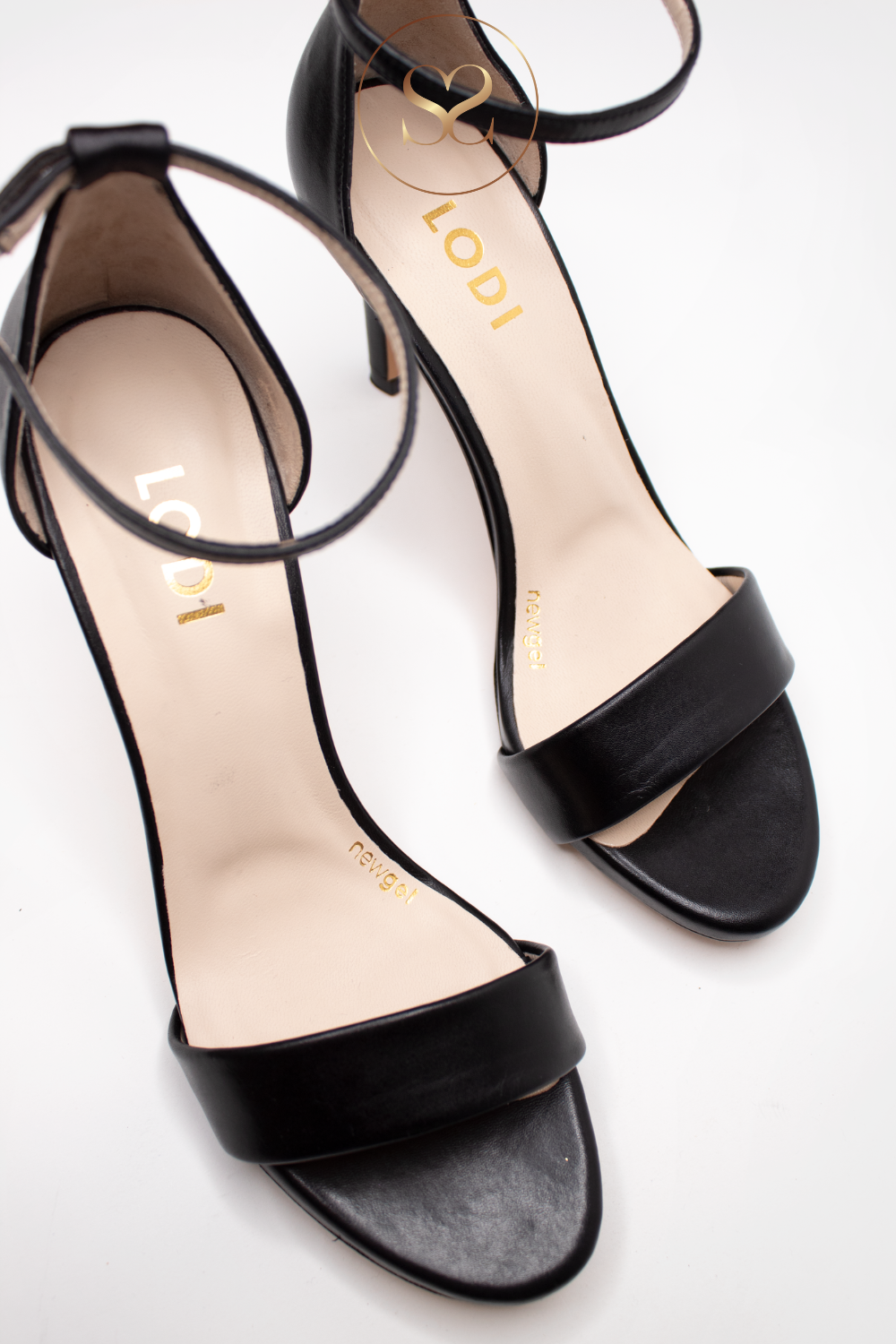 HIGH HEELS FROM LODI IN BLACK LEATHER. CLASSIC BARELY THERE SANDAL