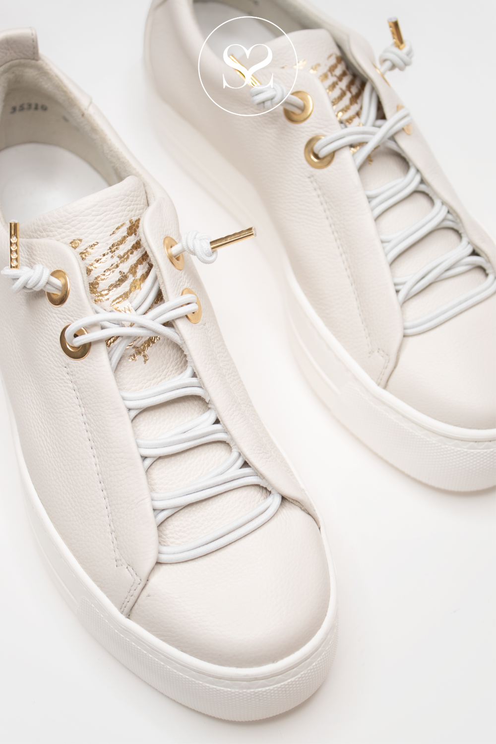 SLIP ON TRAINER STYLE FROM PAUL GREEN IN A SOFT OFF WHITE. COMES WITH A FLATFORM SOLE AND GOLD FINISHINGS. PAUL GREEN SHOE STYLE: 5017