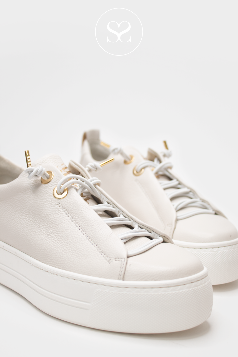 SLIP ON TRAINER STYLE FROM PAUL GREEN IN A SOFT OFF WHITE. COMES WITH A FLATFORM SOLE AND GOLD FINISHINGS. PAUL GREEN SHOE STYLE: 5017