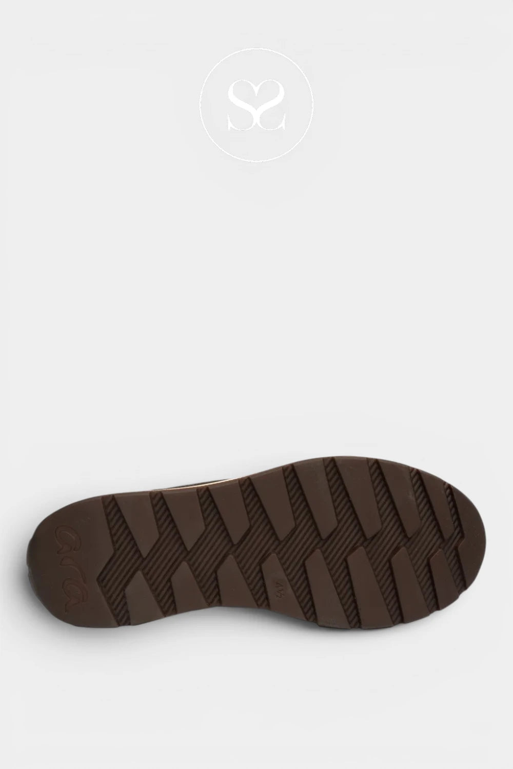 A close-up, top-down view of a dark brown textured shoe sole against a light gray background.