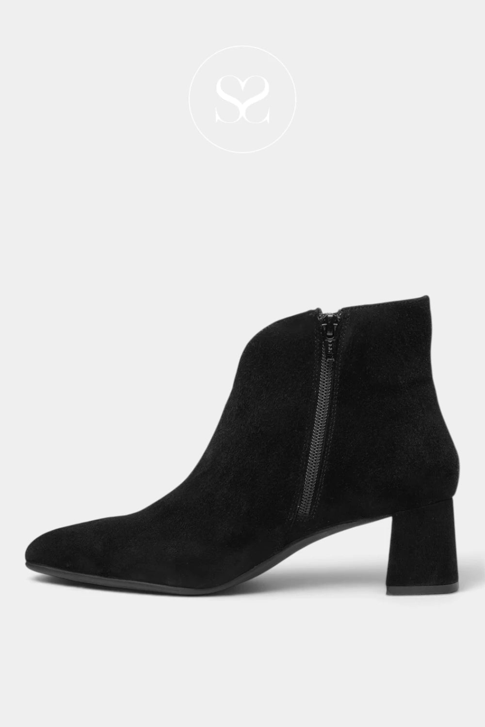A black suede ankle boot with a block heel and side zipper, shown from a side profile on a light gray background.
