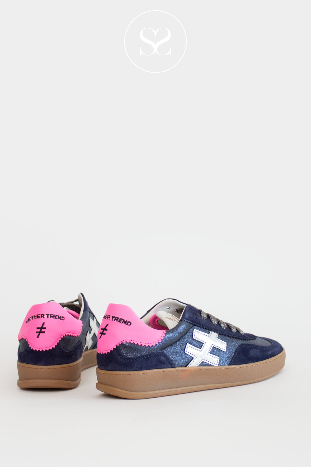 Navy sneakers with pink accents on a white background from Another trend - Available in Ireland