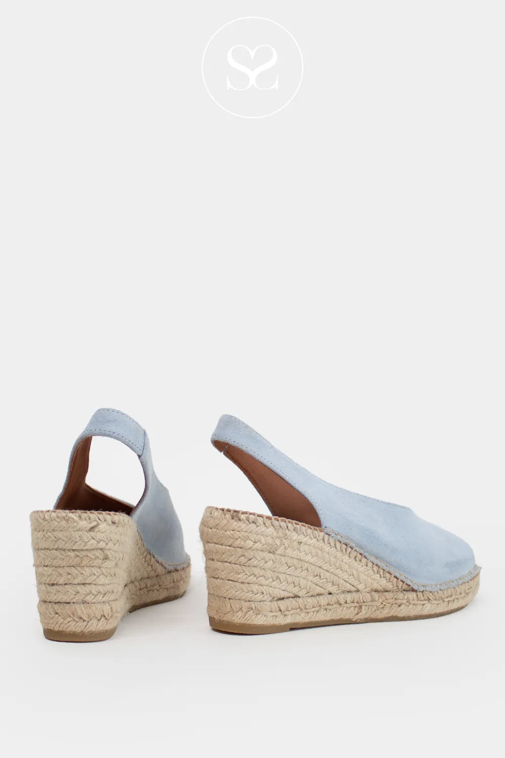 Light blue peep toe wedge sandals. Espadrille sandals with elasticated slingback strap. 