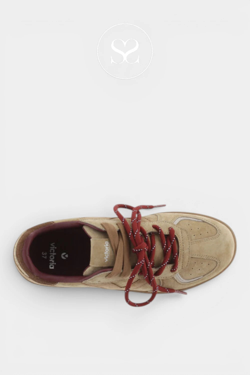A top-down view of a beige suede sneaker with burgundy laces and a burgundy inner sole, shown on a light gray background.