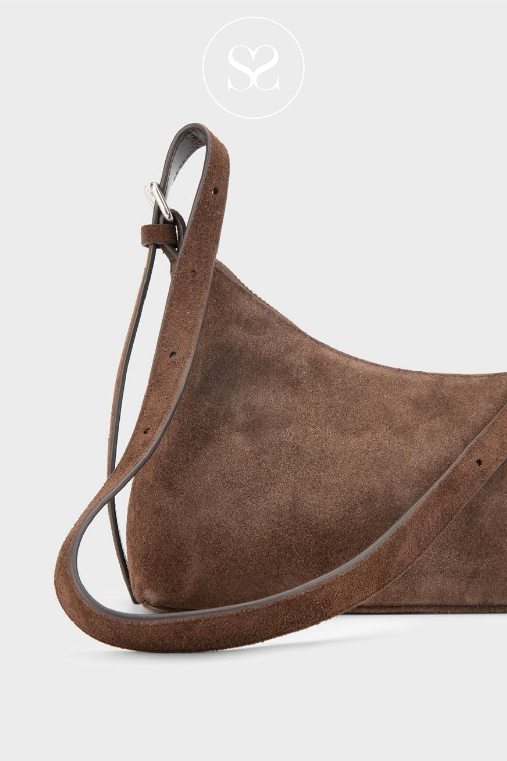 Brown suede handbag with an adjustable strap