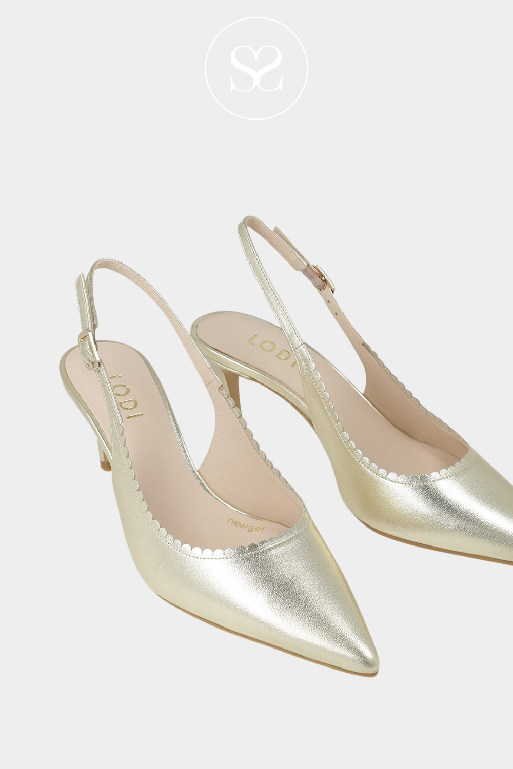 Lodi Noan gold pointed toe slingback mid heels with adjustable ankle strap and scalloped edge.
