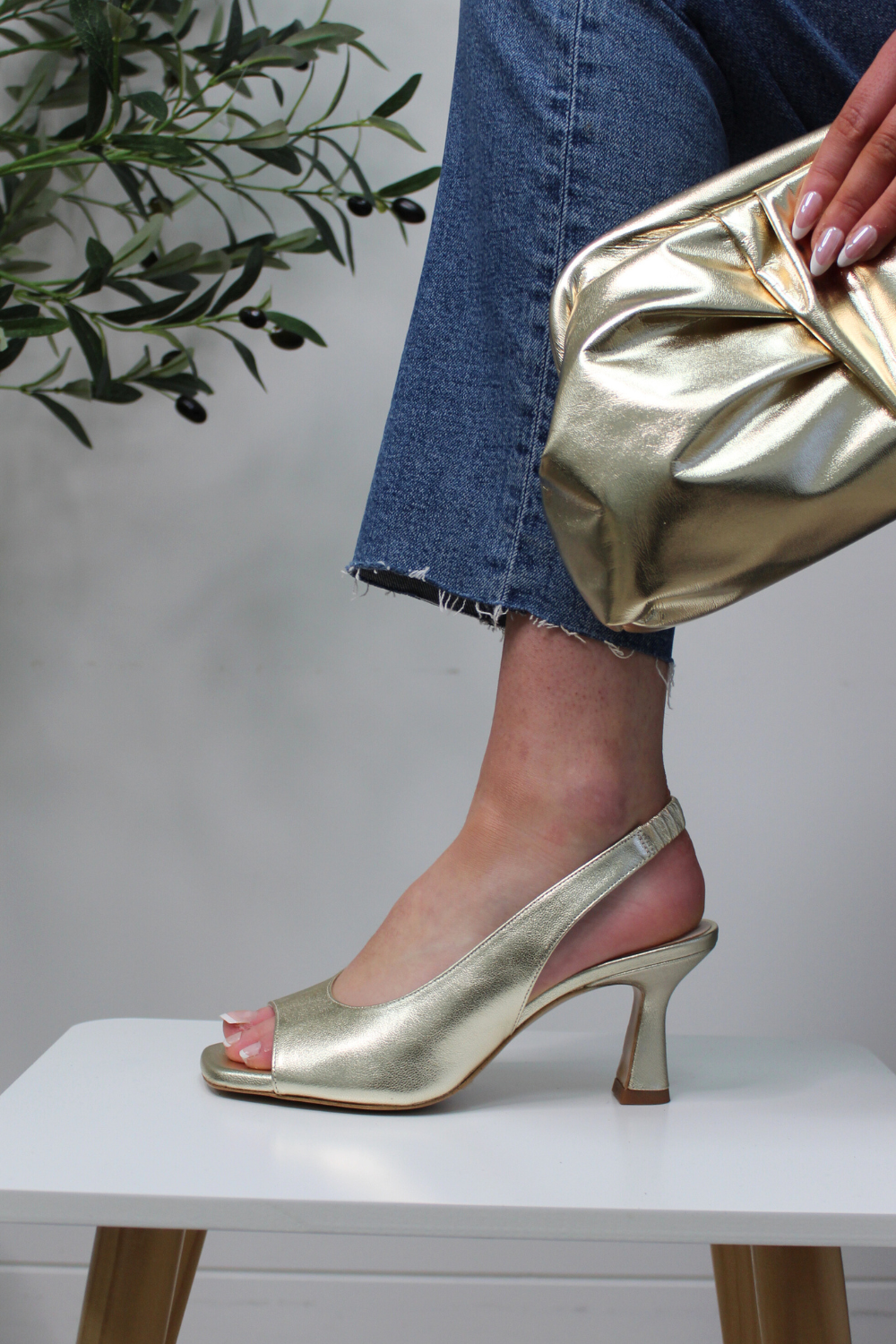 Lodi Ludvig gold leather slingback sandals. Mid heel flared heel sandals