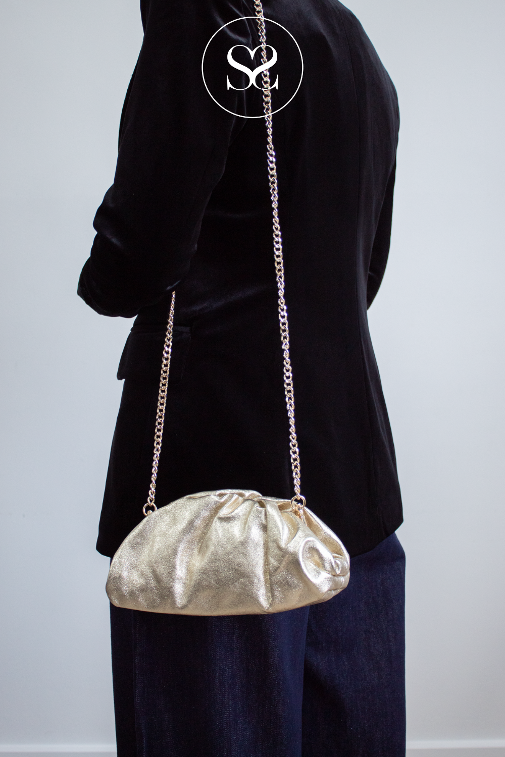 Sheneil Gold small Leather Slouch Clutch Bag - 502320