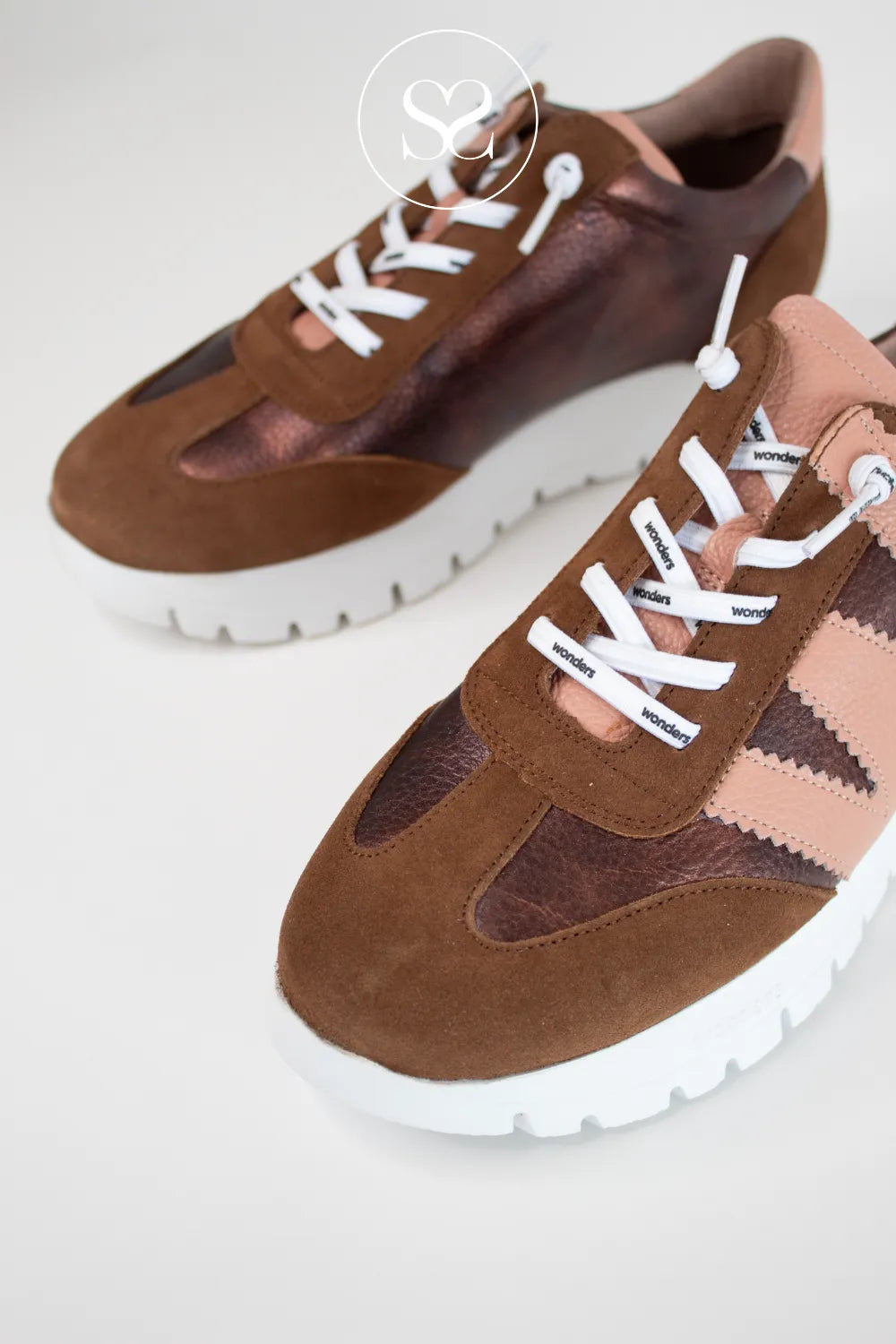 Buy brown trainers for ladies from wonders - slip on style with white wedge sole