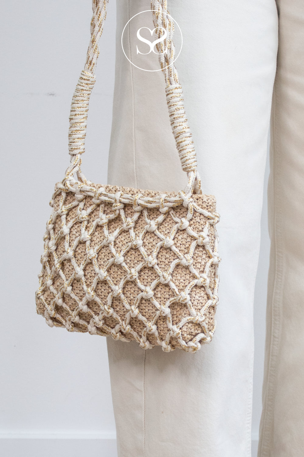 woven handbag from Unisa in soft cream, gold and beige colour