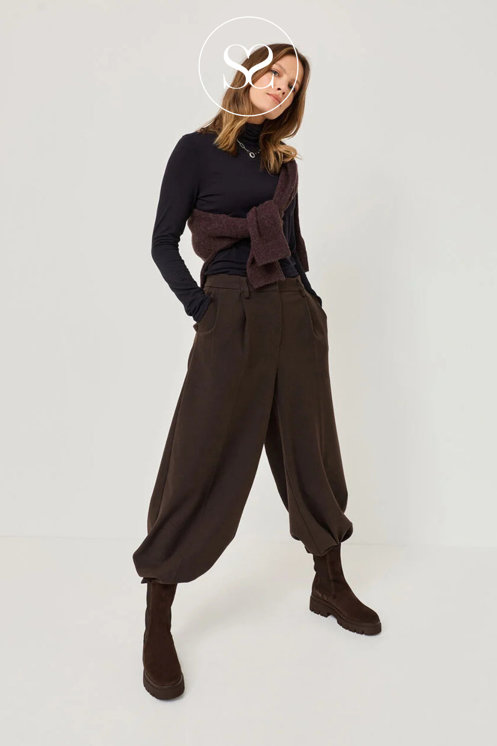 Chocolate brown round toe chunky boots. Pull on style chelsea boots