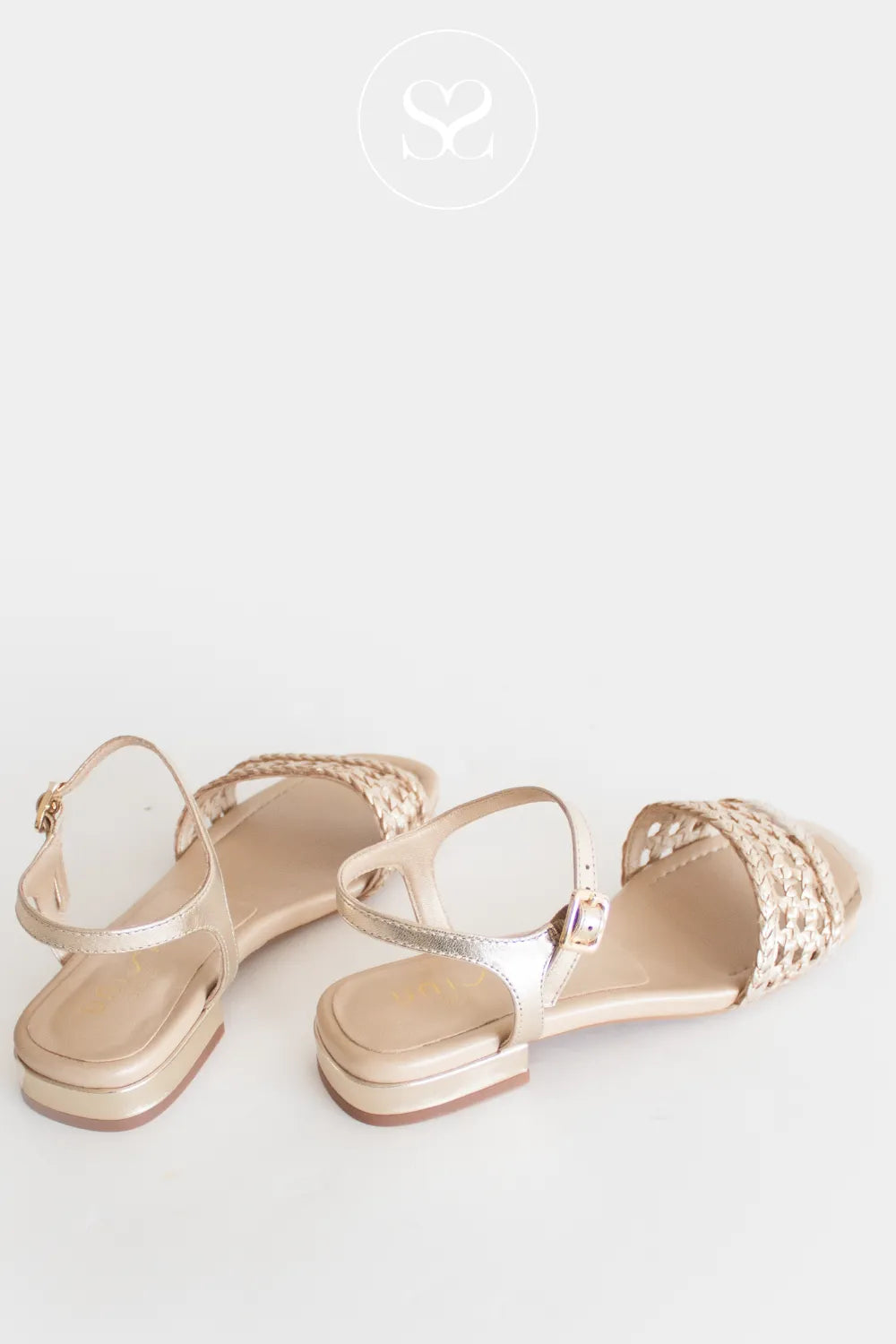 Metallic gold simple ballet sandal with open toe, adjustable ankle strap and woven front strap. 