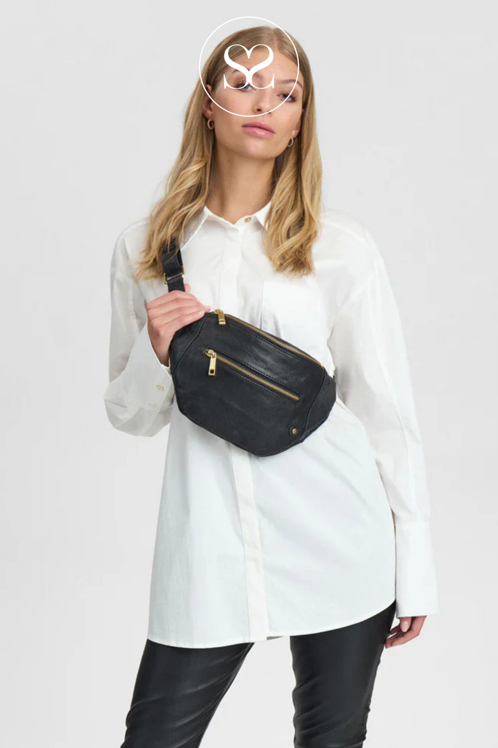 Woman wearing Depeche Black Leather Crossbody Bumbag - 12346
