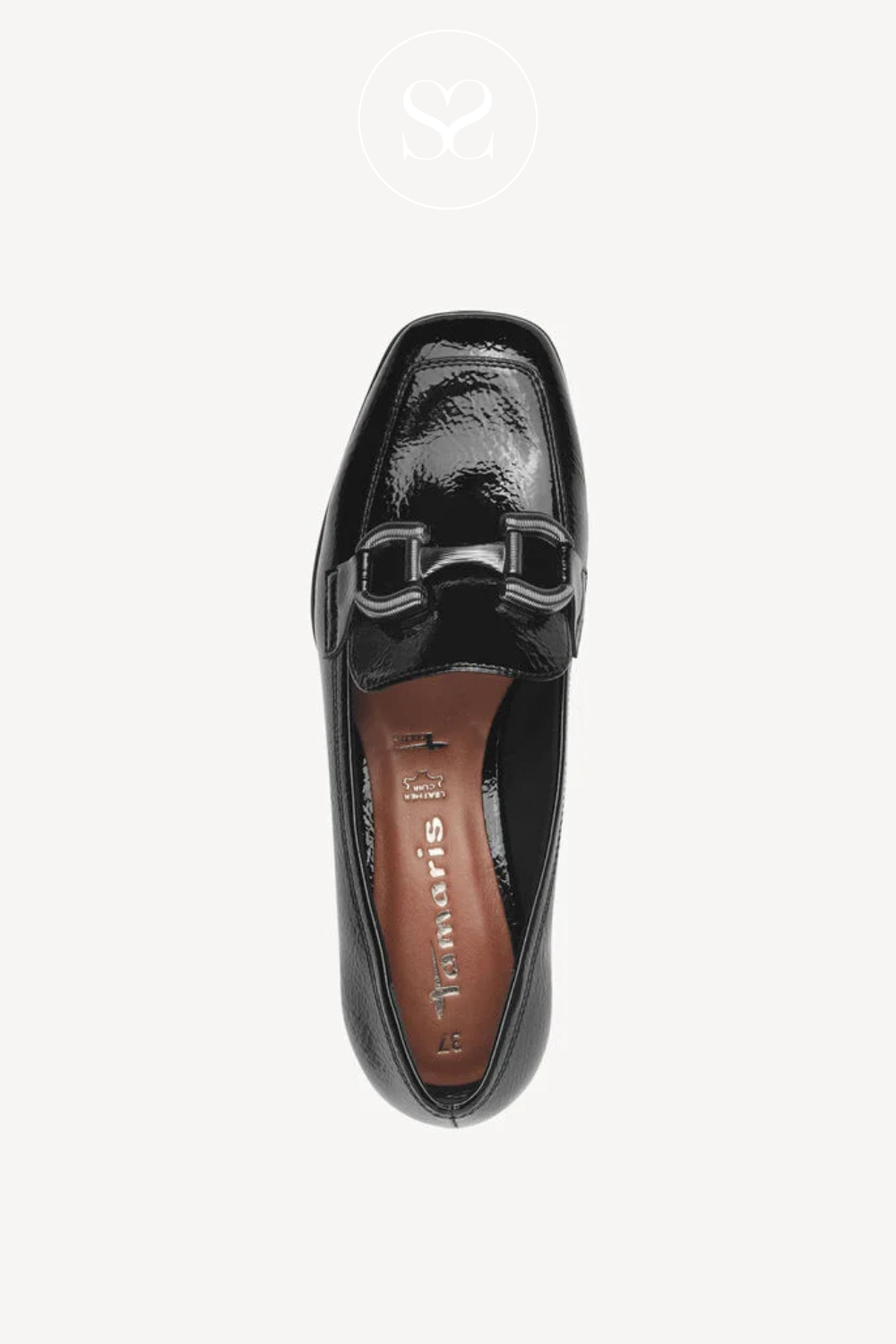 Shiny black shoe. Black patent heeled loafers. Low block heel, Slightly square toe.