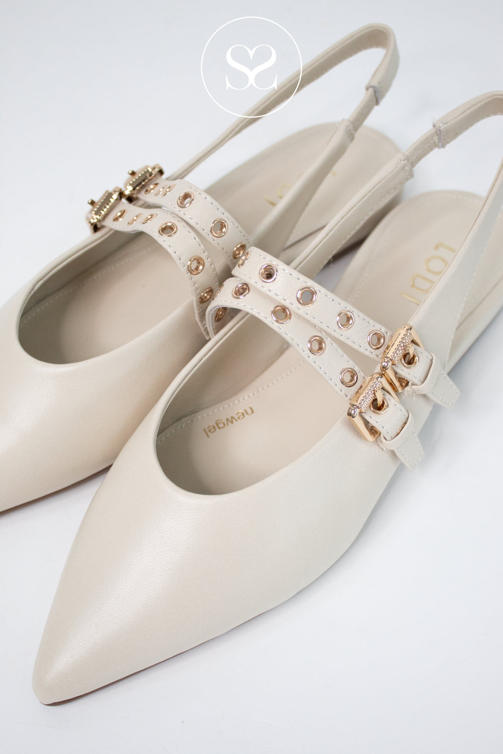 Beige pointed-toe shoes with gold embellishments from Lodi in Ireland