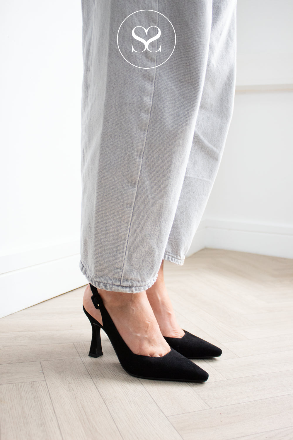 Comfortable Black suede high heeled slingbacks with pointed toe and adjustable buckle strap from Lodi in Ireland