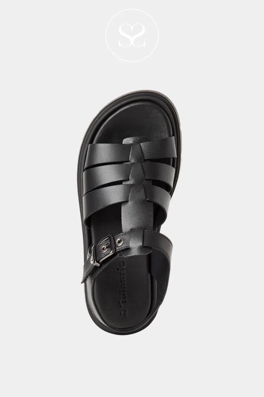 Black sandals with thick straps. Comfortable chunky flatform sole and adjustable ankle strap.