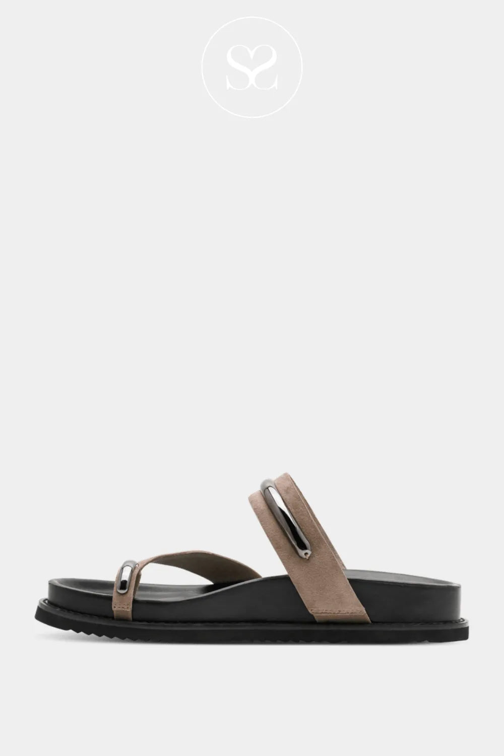 Taupe suede slider sandals with taupe toe ring and silver hardware. Slightly wedge sole under the arch.