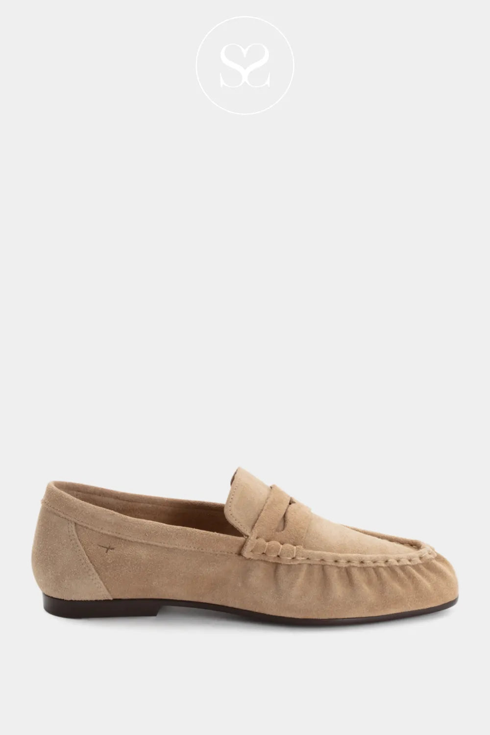 Beige suede round toe slip on loafers. Mocassin style. Comfortable, transitional workwear trendy slip on shoe.