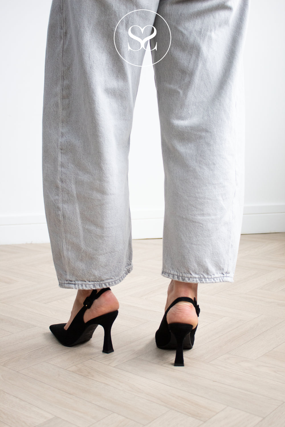 Black Suede High Heeled Slingbacks with pointed toe from Lodi