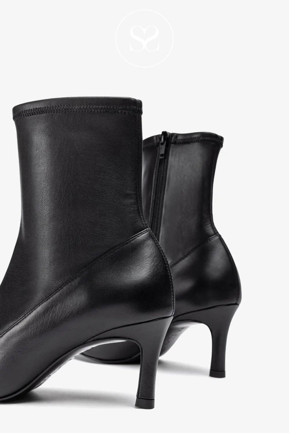 Unisa black heeled boot for women with side zip