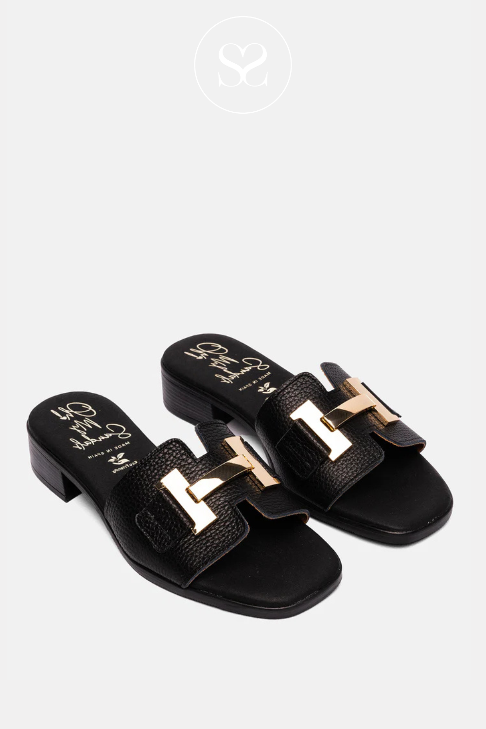 black slider mules for women with gold buckle and low block heel