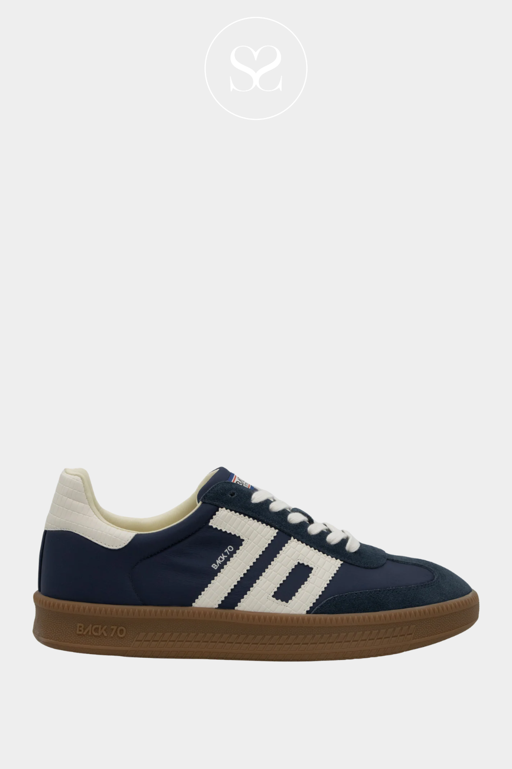 Women's Back70 Navy Retro Trainer in navy blue leather and chunky white laces, showcasing retro sportswear style.