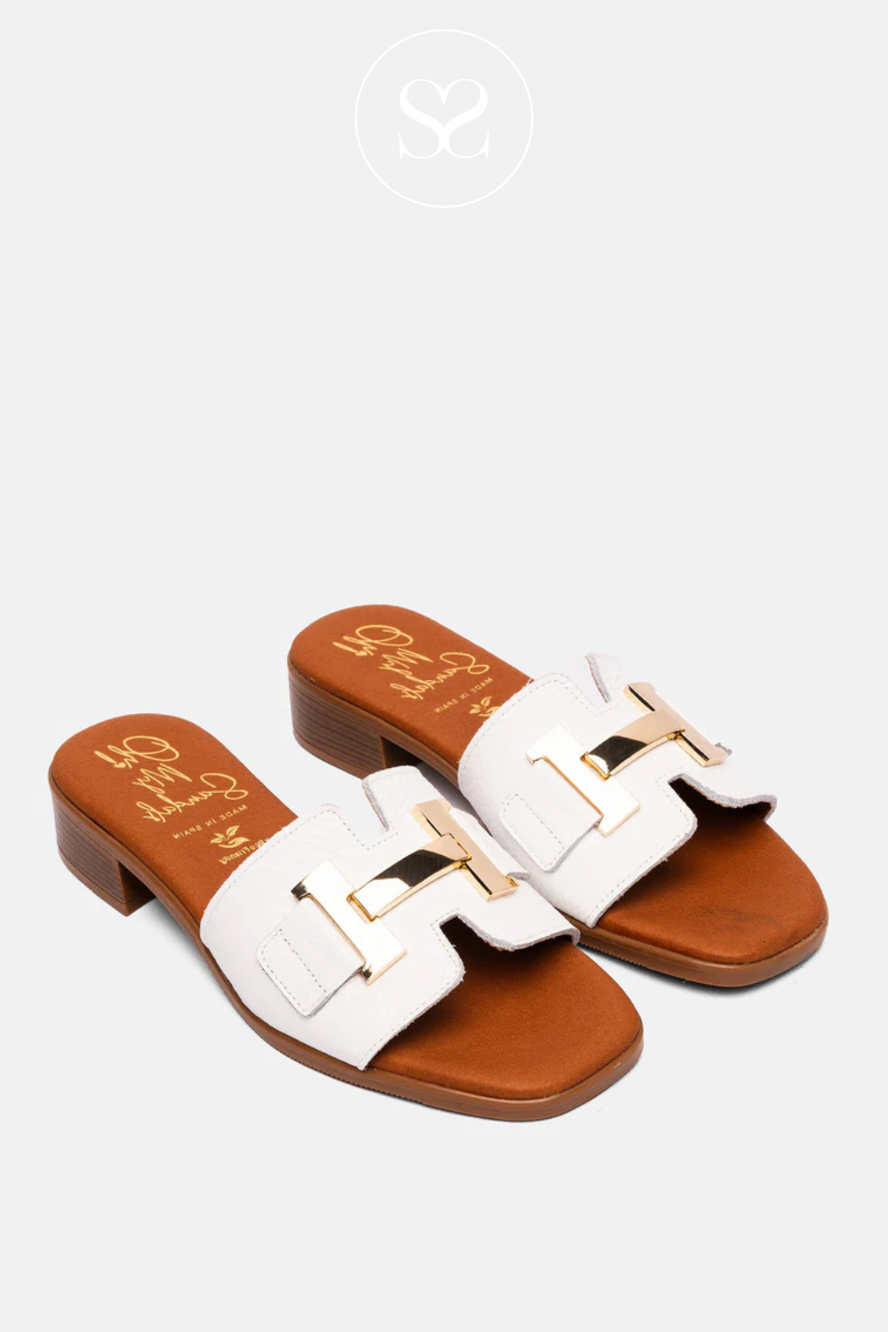 oh my sandals white mule sandals with gold buckle