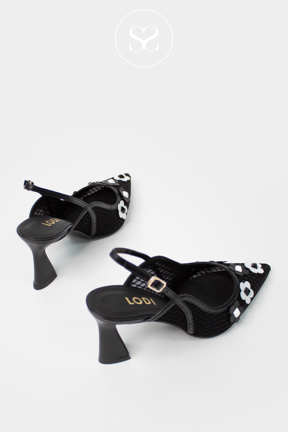 LODI RASERIA BLACK SLINGBACK HIGH HEEL WITH WIDE BASE AND ADJUSTABLE STRAP. WHITE FLOWER EMBROIDERY DETAIL ON POINTED TOE