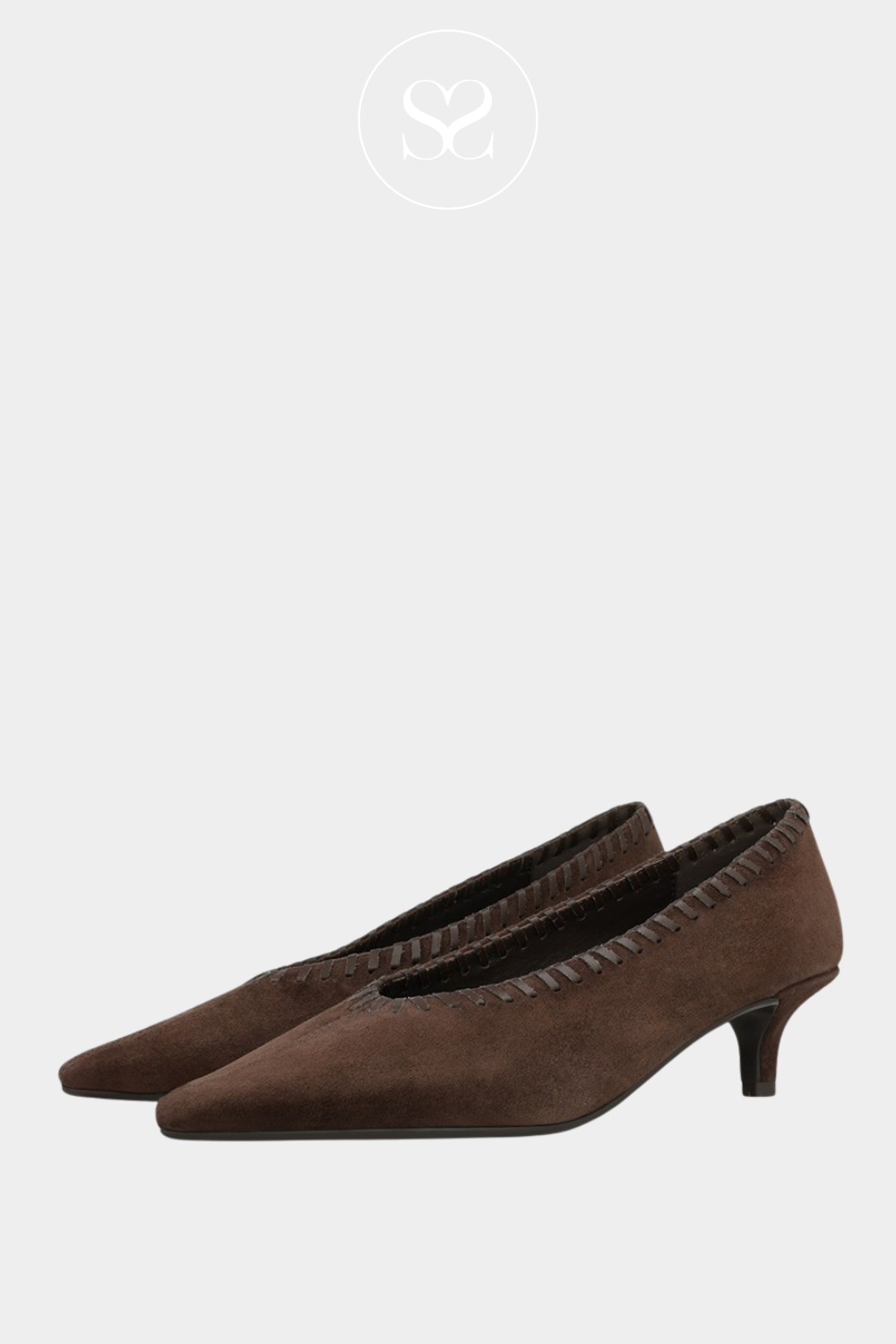 Brown suede low heels. Comfortable heels. Pointed toe. Woven detail around shoe