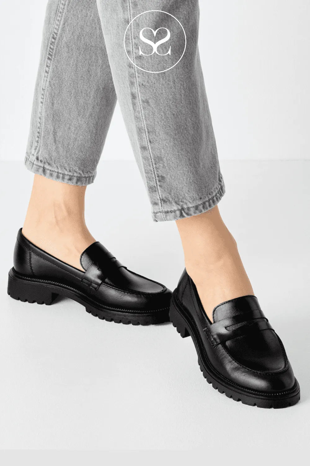 Black slip on leather shoes. Chunky black leather loafers.
