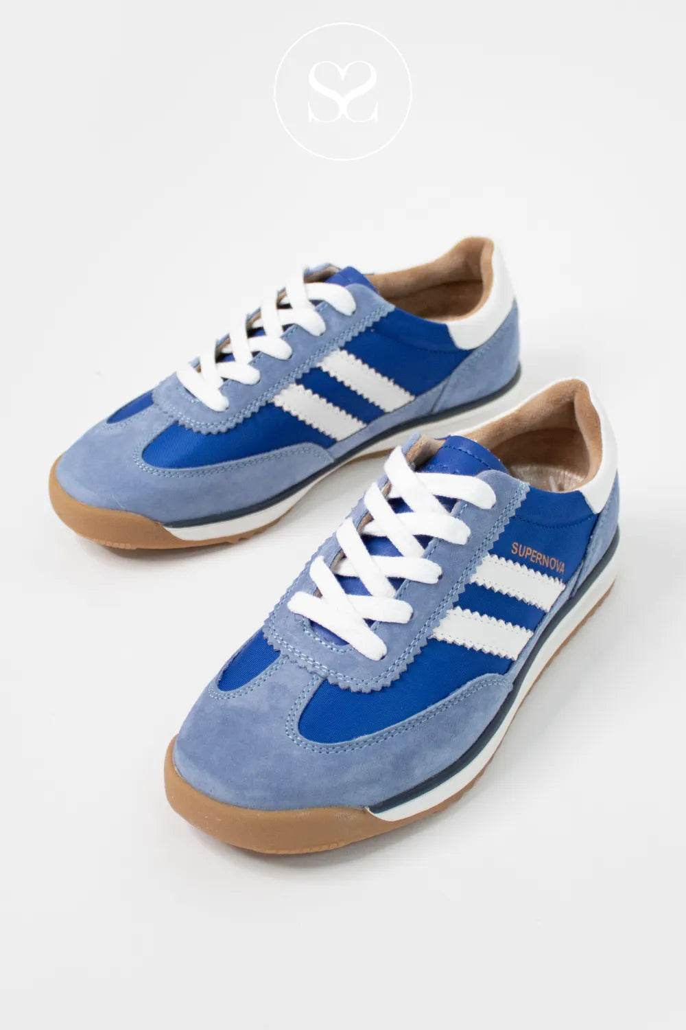 Drilleys Blue Low Profile Trainers- Seventy Three trainers with white crisp laces and white stripe details on side 
