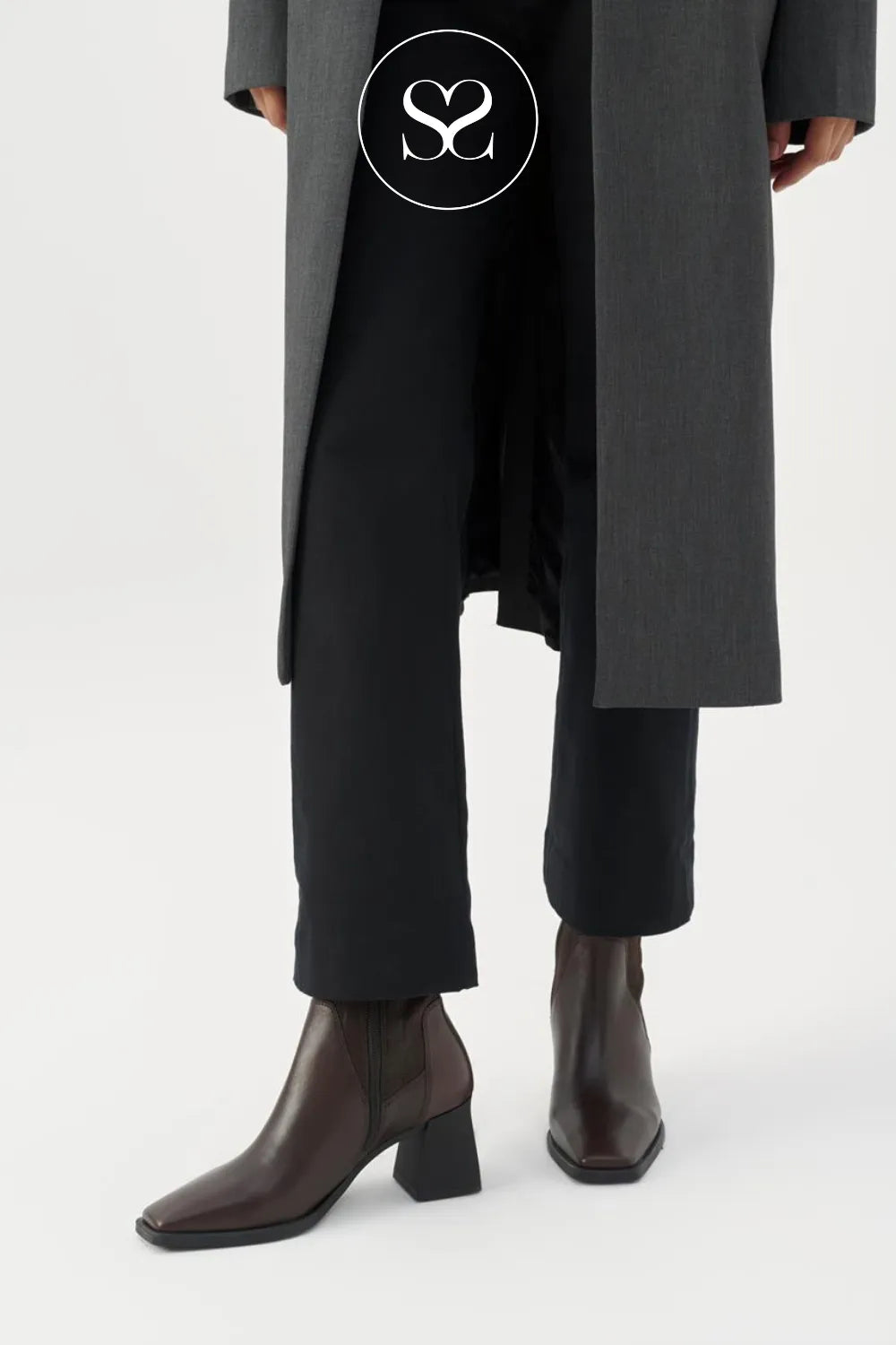 woman wearing vagabond hedda sock boots in brown leather