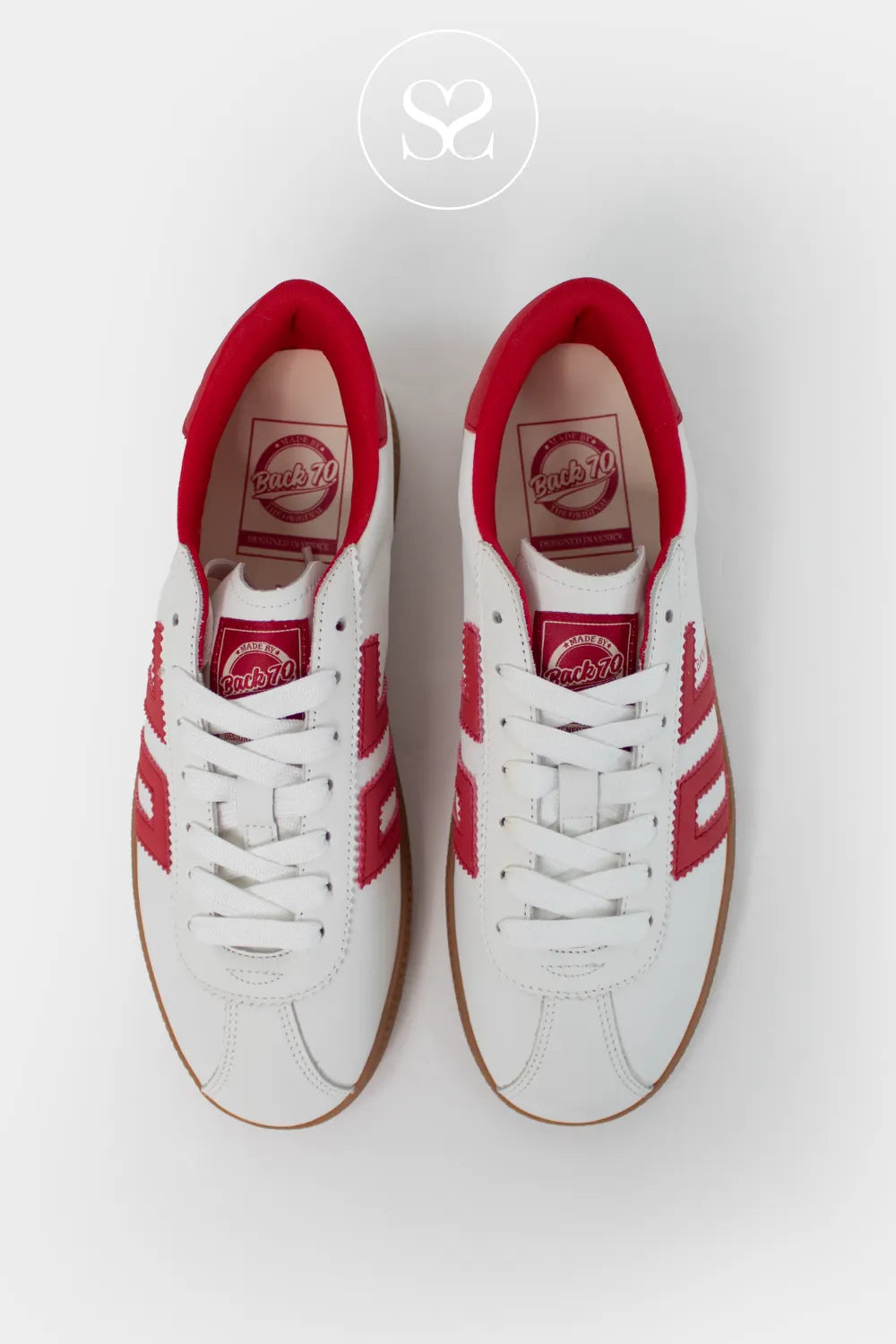 Italian leather white trainers with pop of colour. Red trainers with gum sole and laces. Comfortable, soft leather trainers.