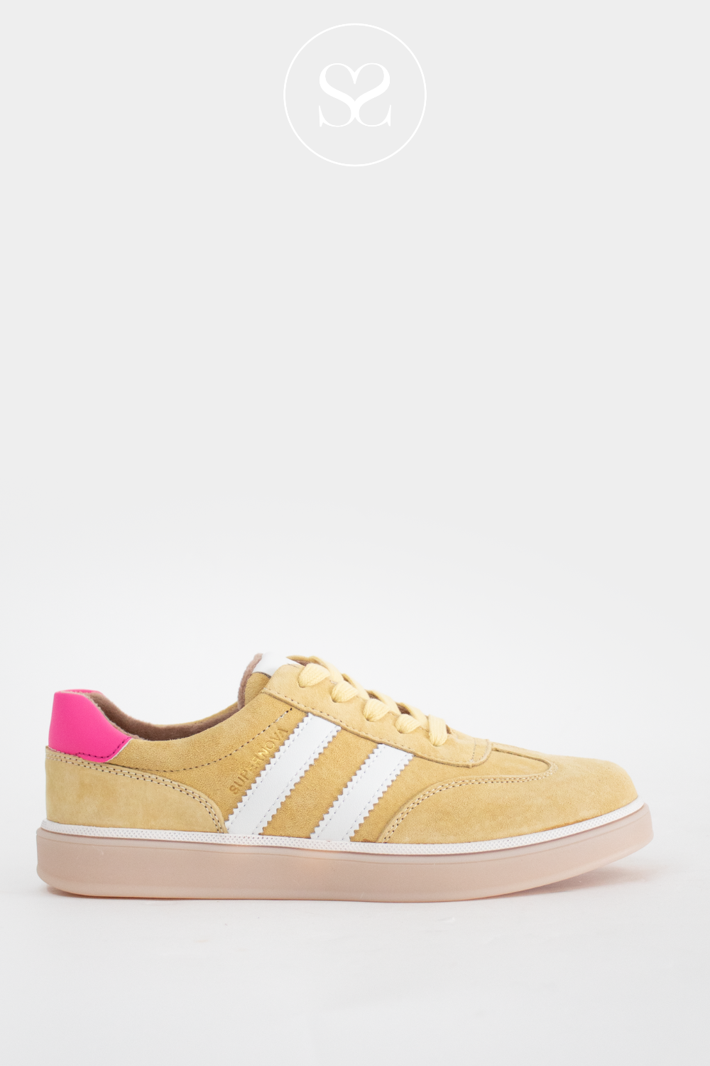 DRILLEYS yellow flat trainers with two white lines on the side and a pink heel cap. Laces and rubber sole.