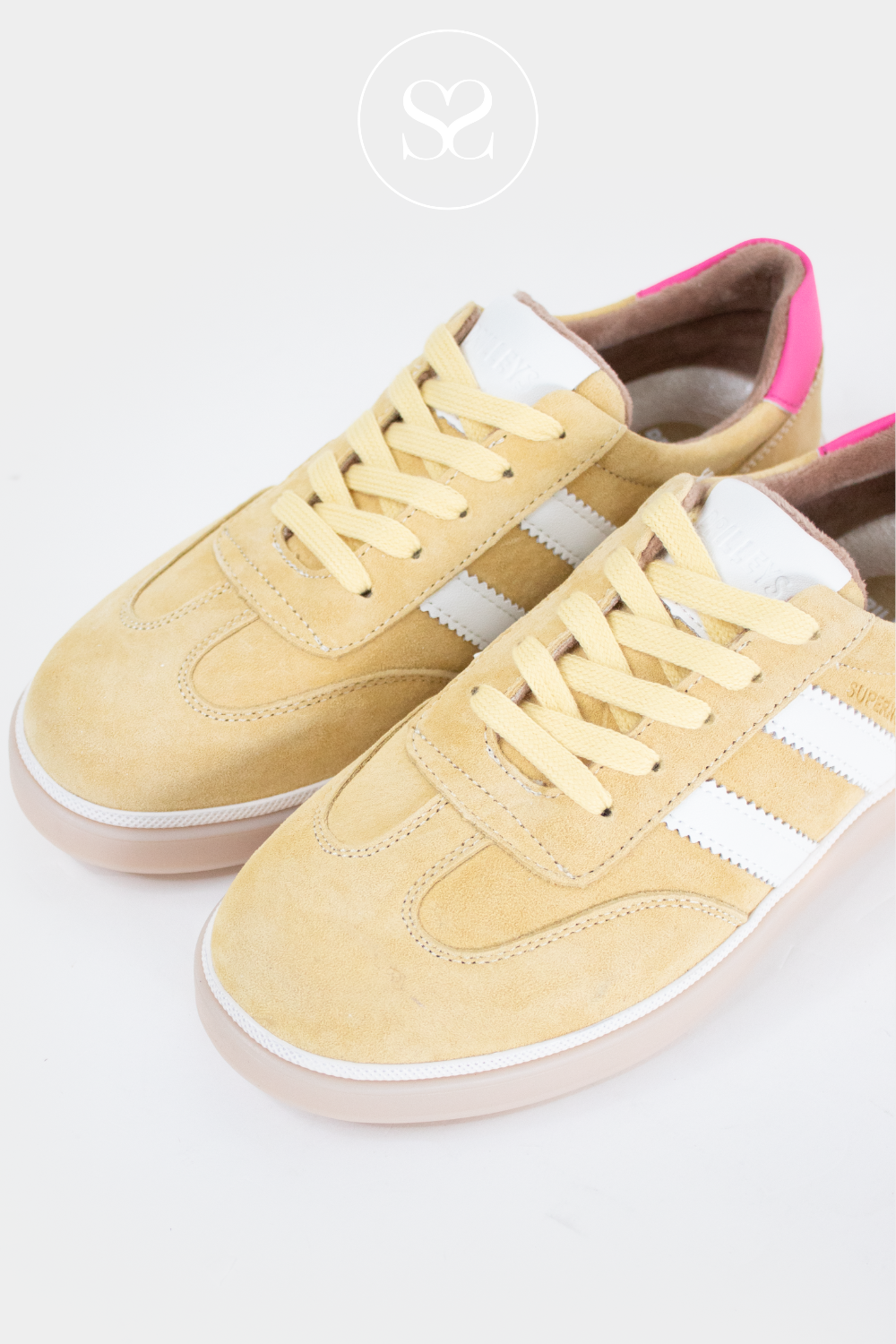 Yellow suede round toe trainers with laces and pink heel cap. Affordable sneakers.